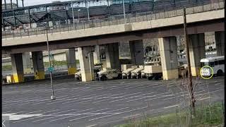 Military Guard Units Post Up In Baltimore Under Bridge Overpass Near Stadiums