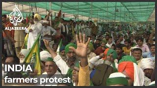 India farmers protest over new laws benefitting big firms