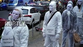 Germany: Coronavirus sceptics wearing "ghost-like" uniforms march in Berlin