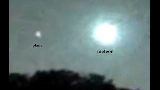 Meteor blazes trail through atmosphere not far from plane as it turns night into day!